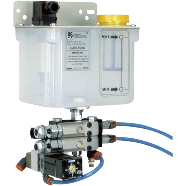 Unità compatta Flott per lubrificazione a minima quantità, con pompa dosatrice e ugello micro-nebulizzatore per foratrici 13–15 Plus.